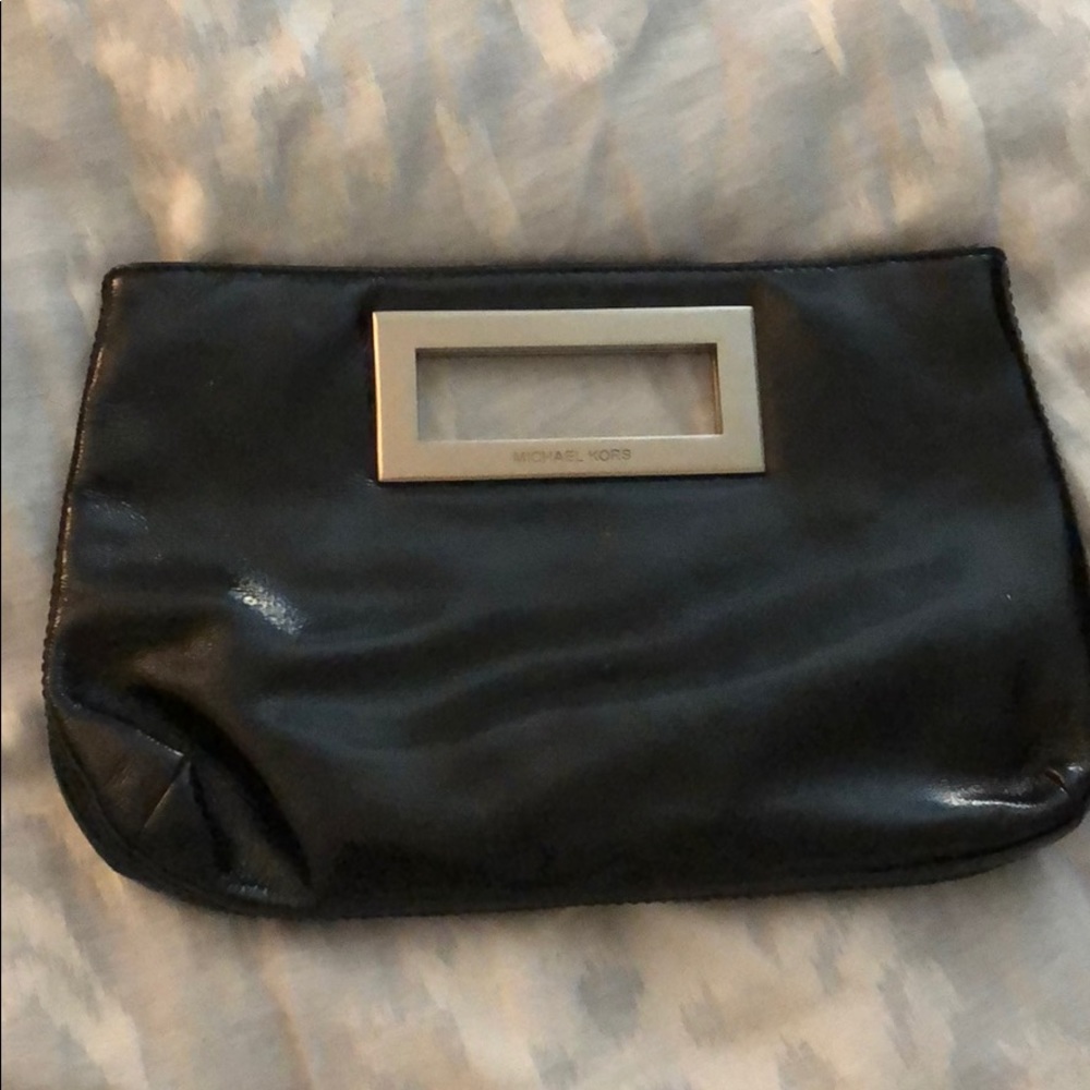 Black patent leather Michael Kors clutch